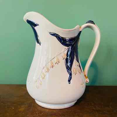 Stoneware pitcher with lily of the valley embossed design, c. 1870s