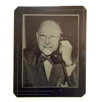 Engraver's plate with portrait of Otto Rittler using a telephone