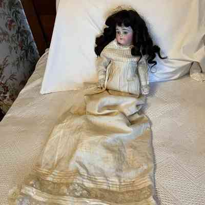 Bisque doll with christening style dress, c. 1890s