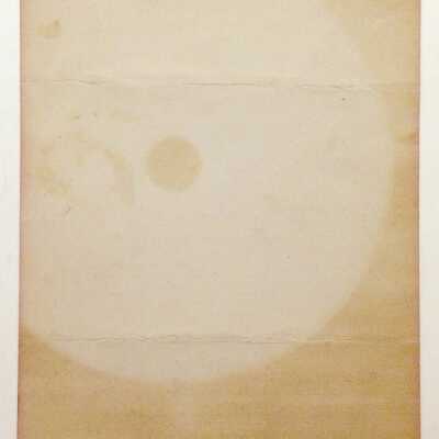 Interesting acid-paper stain on the reverse.