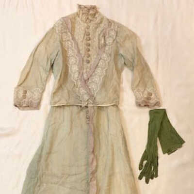 Two-piece striped dress with lace trim and high collar, c. 1912