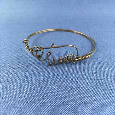 Gold plated twisted wire bracelet of Olive Turner Toye, early 1900