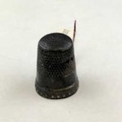 Silver thimble size 10 with stippled dome of Margaret Adeline Toye, early 1900s