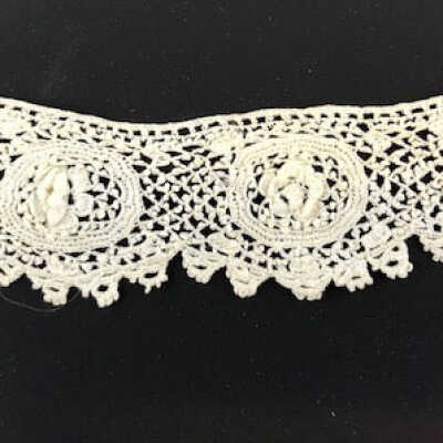 Hand crocheted ecru lace of floral motif, early 1900s