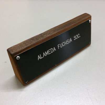 Redwood tabletop sign of the Alameda Fuchsia Society, prior to 1980