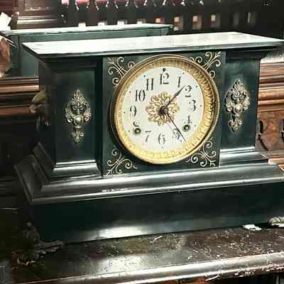 Ansonia Clock Co. cast iron clock of Emma Young, c. 1900