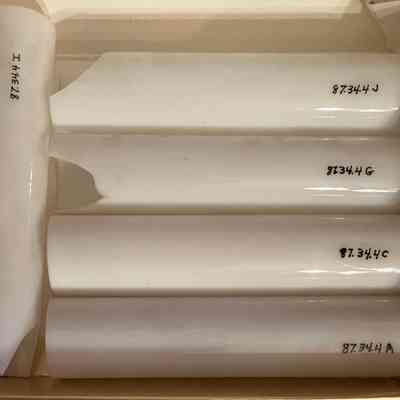 Cylindrical milk glass candles from he Meyers House, c. 1897