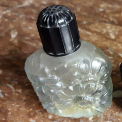 Frosted glass perfume botthe with embossed flowers, prior 1997