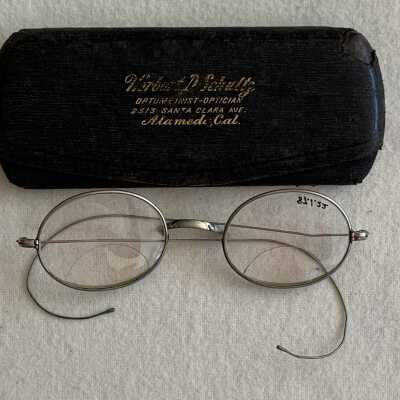 Eyeglasses with nickel plated frames and oval lenses, c. 1920s