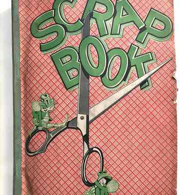 Scrapbook with picture of elves with scissors, of H. D. Maynard, c. 1930s