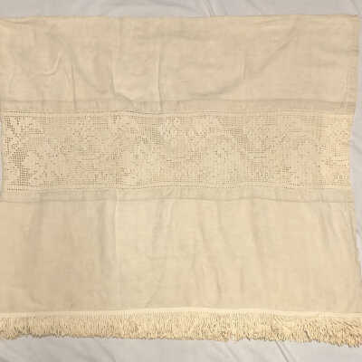 Bedspread with crocheted panels of the McDonell family