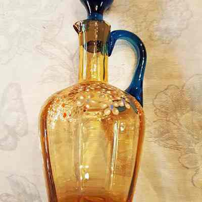 Liqueur Set of amber glass with blue handle and enameled flowers, 1900