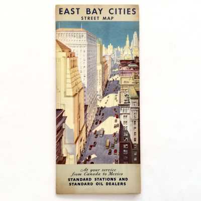 Folding map with aerial view of buildings, 1938