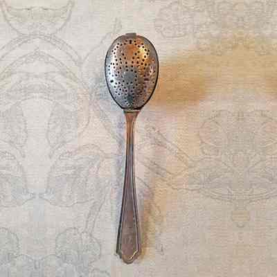 Silver spoon with hinged cover of the Dyer family, c. 1920 to 1930