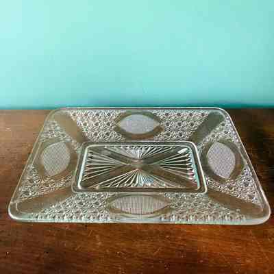 Glass bread plate of Button & Daisy design of the McDonell family, c. 1890s