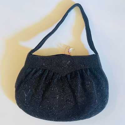 Fabric evening bag with stylized flowers in black beads, c. 1950