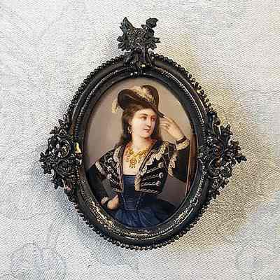 Framed porcelain miniature of a woman in Tyrollian style hat, c. 1880s