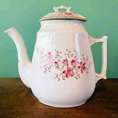 Teapot with pink blossoms and gold rim, c. 1900