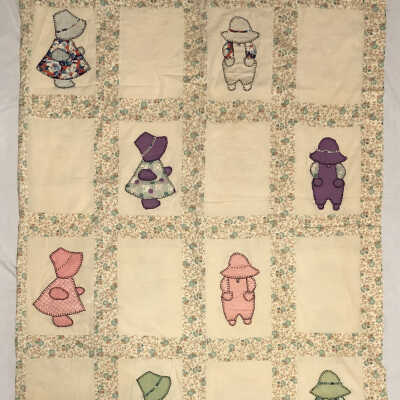 Pseudo Quilt bedspread with applique children wearing bonnets, c. 1920s