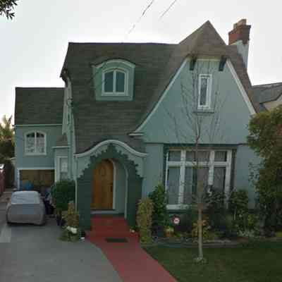 2626 Calhoun, dormer, forward porch, leaded glass window, overhang with brackets, but mirrored and different detailing.: Ph google streetview.