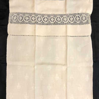 Cotton damask Fleur-de-lis guest towel with crocheted lace, early 1900s
