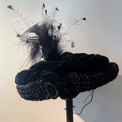 Black straw hat with velvet ribbon and plume of Mrs. Meyers, 1930