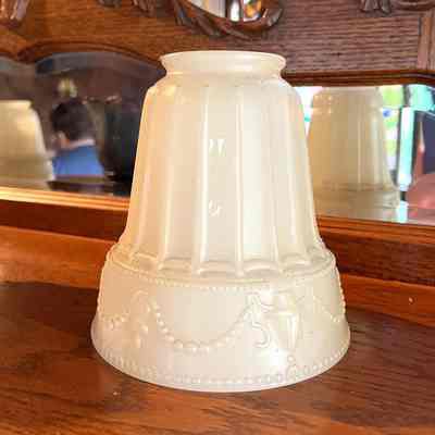 Pressed glass opaque light shades with neo-classical designs, c. 1915-1920