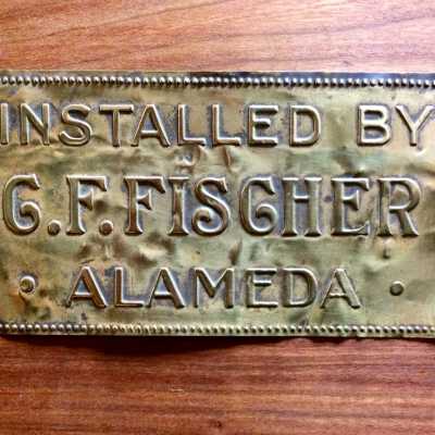 Plaque from a water heater, installed by C. F. Fischer, prior 2015