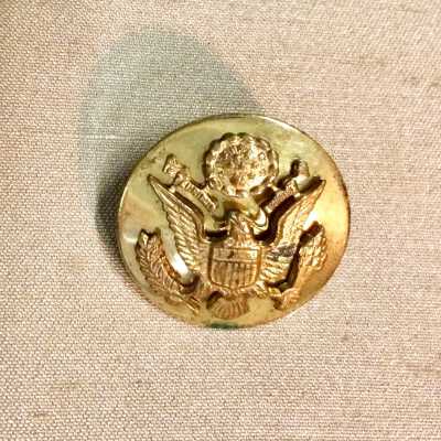 Circular U.S. Army Dress Cap Insignia of Fred W. Krueger, 1941-1945