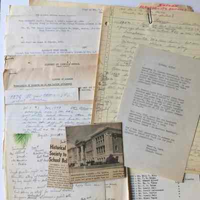 Folder with histories about Schools and the Garfield / Liberty tract, 1950s
