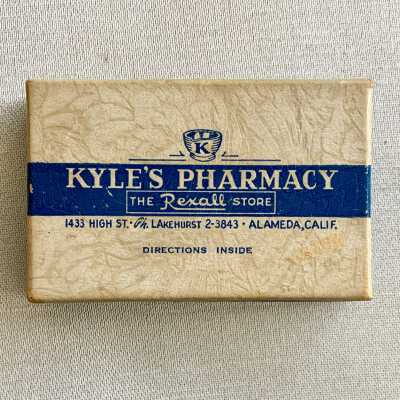 Pill box from Kyle's Pharmacy, with prescription issued by Dr. Lum, 1945