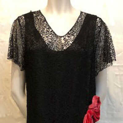 Full length gown of black lace in floral design, c. 1930s