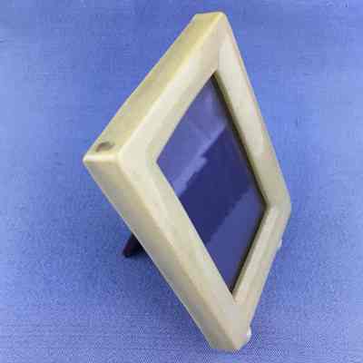 Celluloid photo frame with purple easel backing, c. 1920s