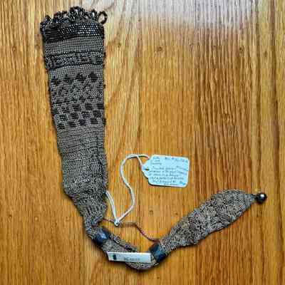 Crochet purse with bead fringe and be decorations, late 19th century
