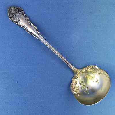 Royal Silverplated ladle with design of roses, earl 1900s
