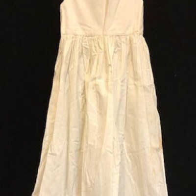 High wasted white cotton slip with flounce and shoulder straps, c. 1895-1896