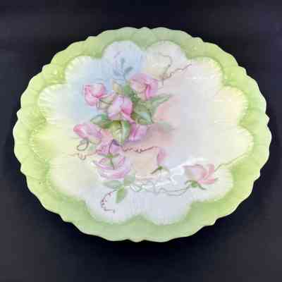 Haviland plate with pink flowers on green background, c. 1890s