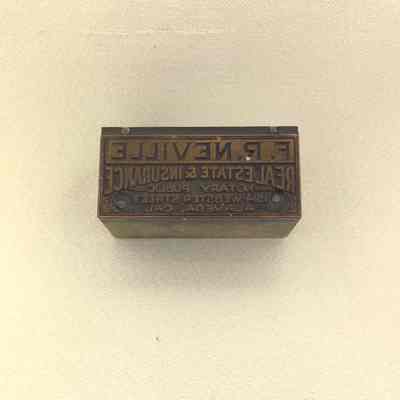 Printer's block for F.R. Neville Real Estate and Insurance, prior 2012