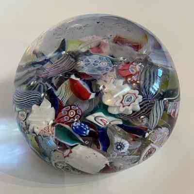 Domed glass paperweight with cane ribbon in Millefiori pattern, c. 1900