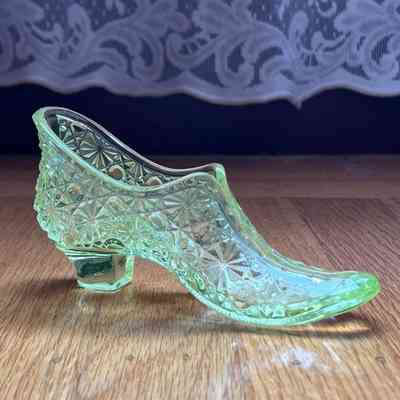 Pressed glass footed slipper in button and daisy pattern, 1890-early 1900