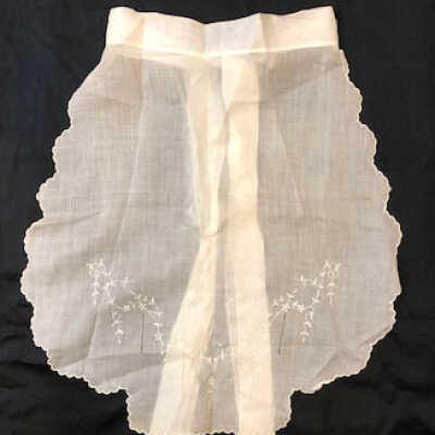 Formal half apron of lawn with silk embroidered flowers, c. 1920s
