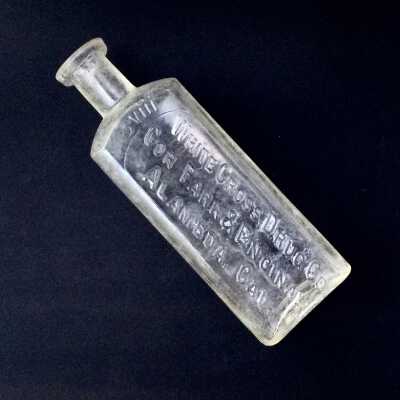8 ounce White Cross Drug Store Medicinal Bottle, c. 1910
