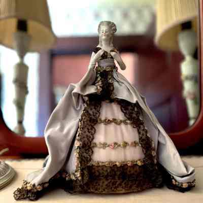 Porcelain pin cushion doll of the Zanaria family, c. 1920
