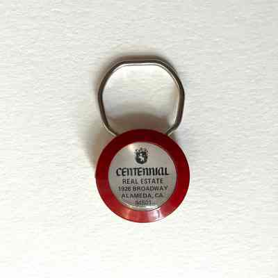 Advertising Key chain for Centennial Real Estate, c. 1980s