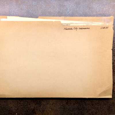 Folder with copies of City Ordinances, lengths of sick leave..., 1920s