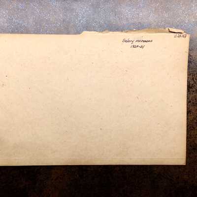 Folder with correspondence about school employees, 1920-1921