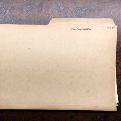 Folder with papers about street improvements, 1919