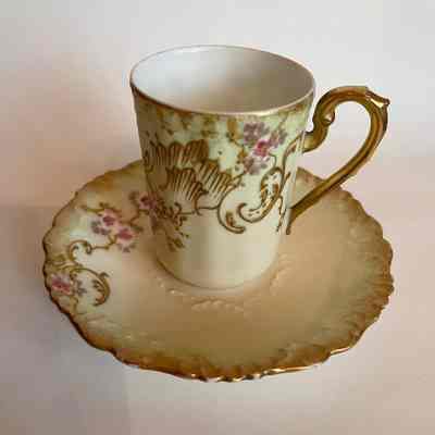 A K C D Limoges porcelain demitasse cup and saucer with rose flowers, c. 1900
