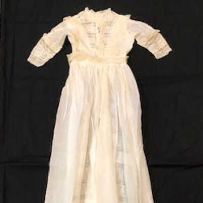 White lawn christening dress, with much lace trim, early 1900s
