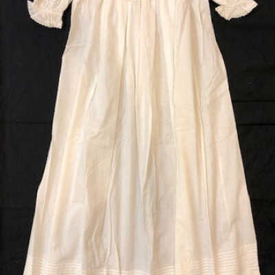 Full length cotton baby dress of the Haslett family, c. 1890s